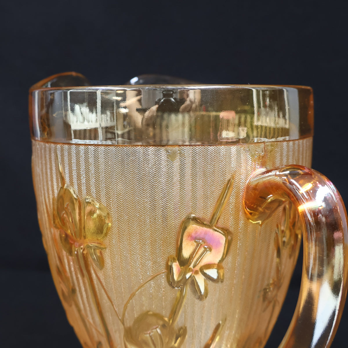 Jeannette Iris and Herringbone Marigold Carnival Glass Pitcher